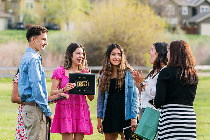 Valley Scholars recipients talking with adults